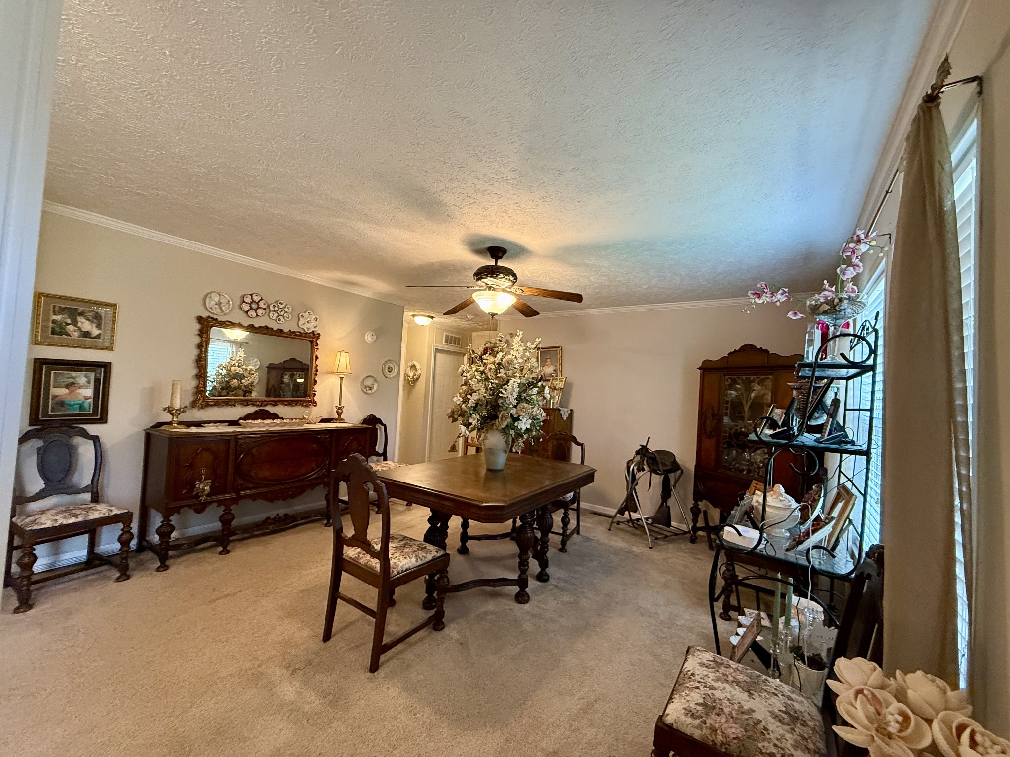 1640 Bucket Branch Road Waverly, TN 37185 - Photo 15 of 38 a living room with furniture and a flat screen tv