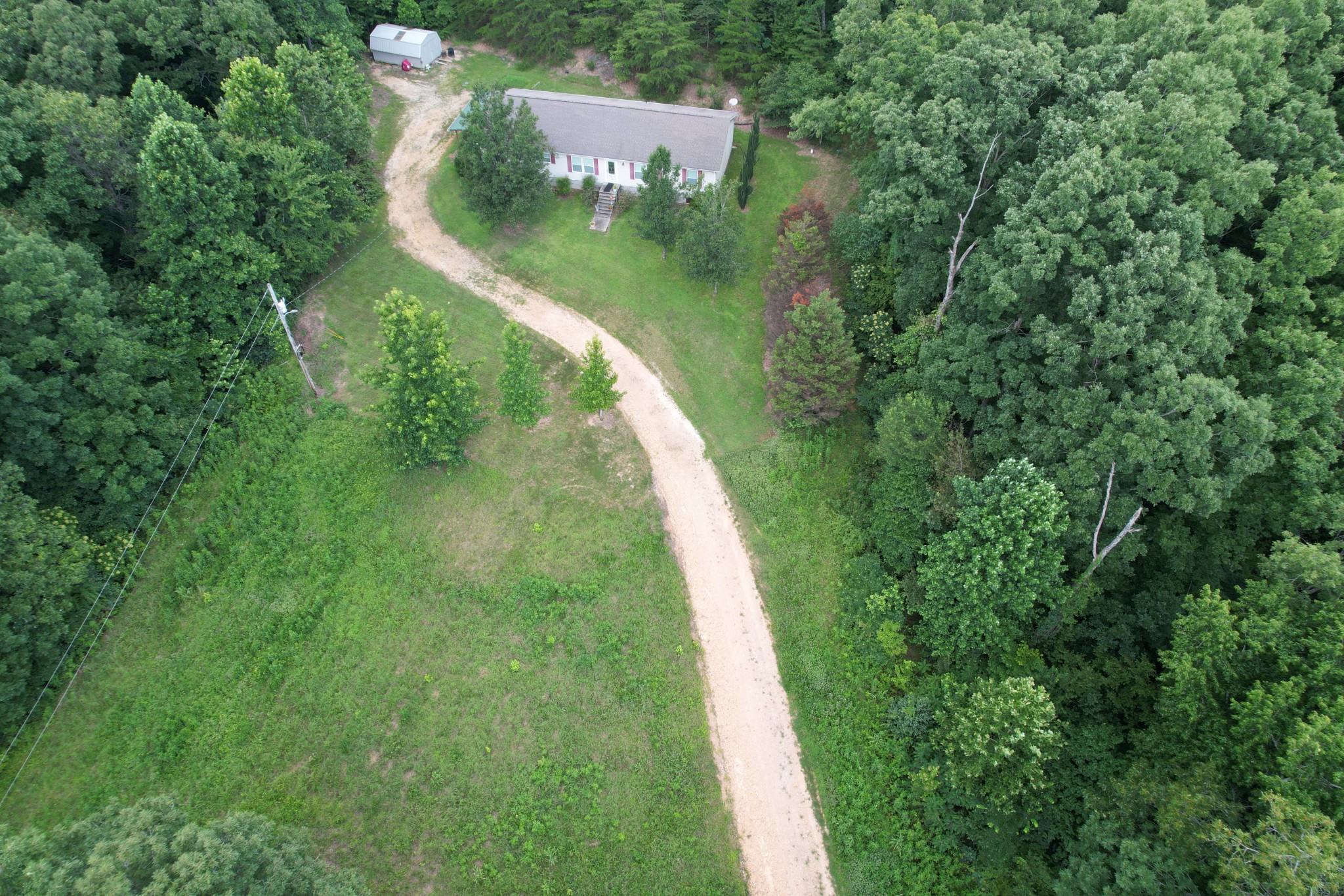 1640 Bucket Branch Road Waverly, TN 37185 - Photo 32 of 38 an aerial view of a house