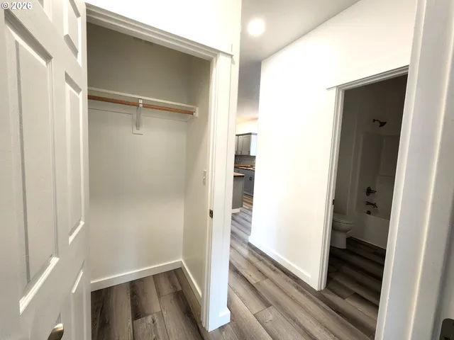 a view of an empty walk in closet