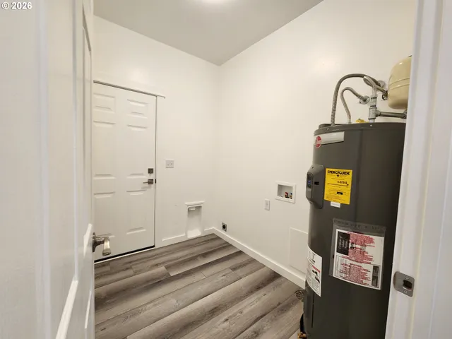 a view of staircase with wooden floor