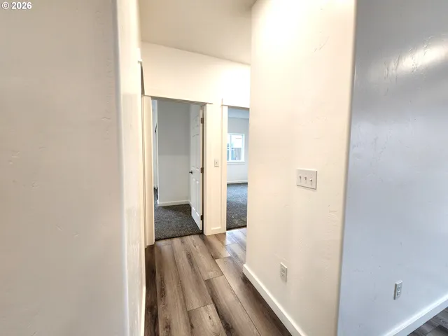 a view of a bathroom with a sink and a mirror