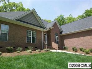 280 Patternote Road Mooresville, NC 28117 - Photo 2 of 8 front view of a house with a yard