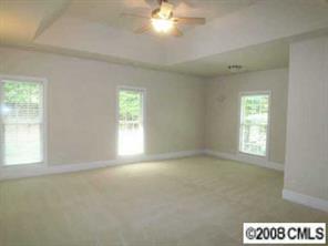 280 Patternote Road Mooresville, NC 28117 - Photo 5 of 8 a view of an empty room with a window