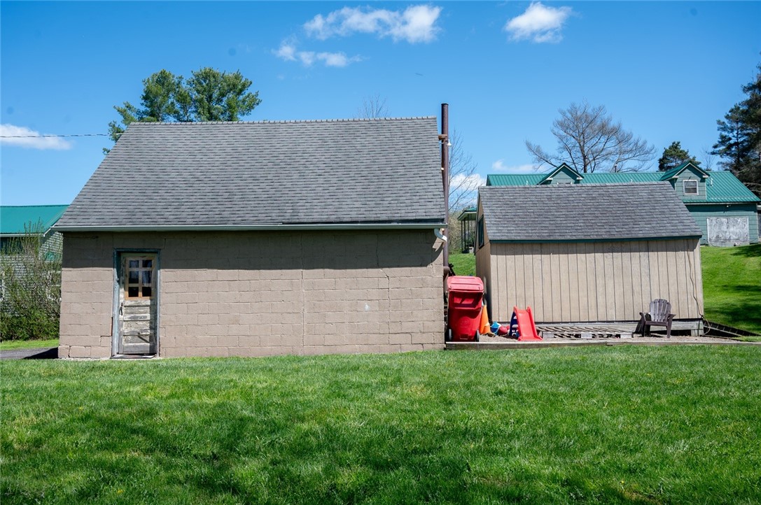 3365 Trapping Brook Road Wellsville, NY 14895 - Photo 35 of 47 Behind the garage is a shed. All of the garden and lawn equipment can be stored away in here.