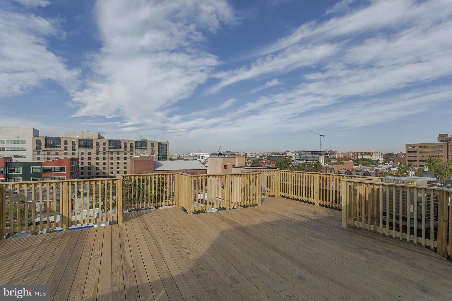 1839 6th Street Northwest, Unit 4 Washington, DC 20001 - Photo 11 of 29 a view of a lake with a terrace