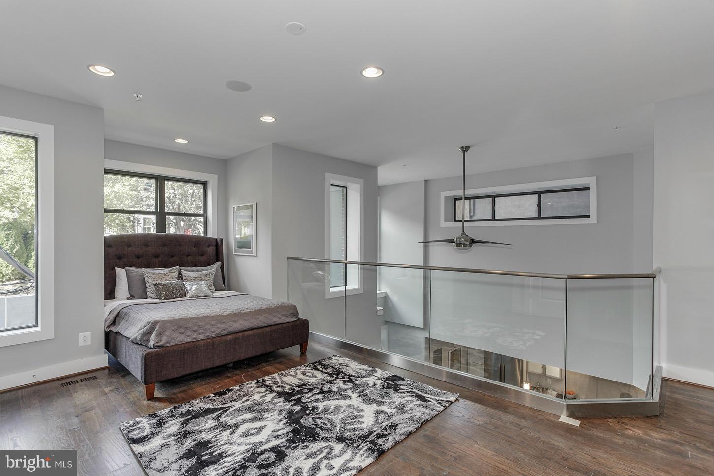 1839 6th Street Northwest, Unit 4 Washington, DC 20001 - Photo 15 of 29 a bedroom with a bed and window