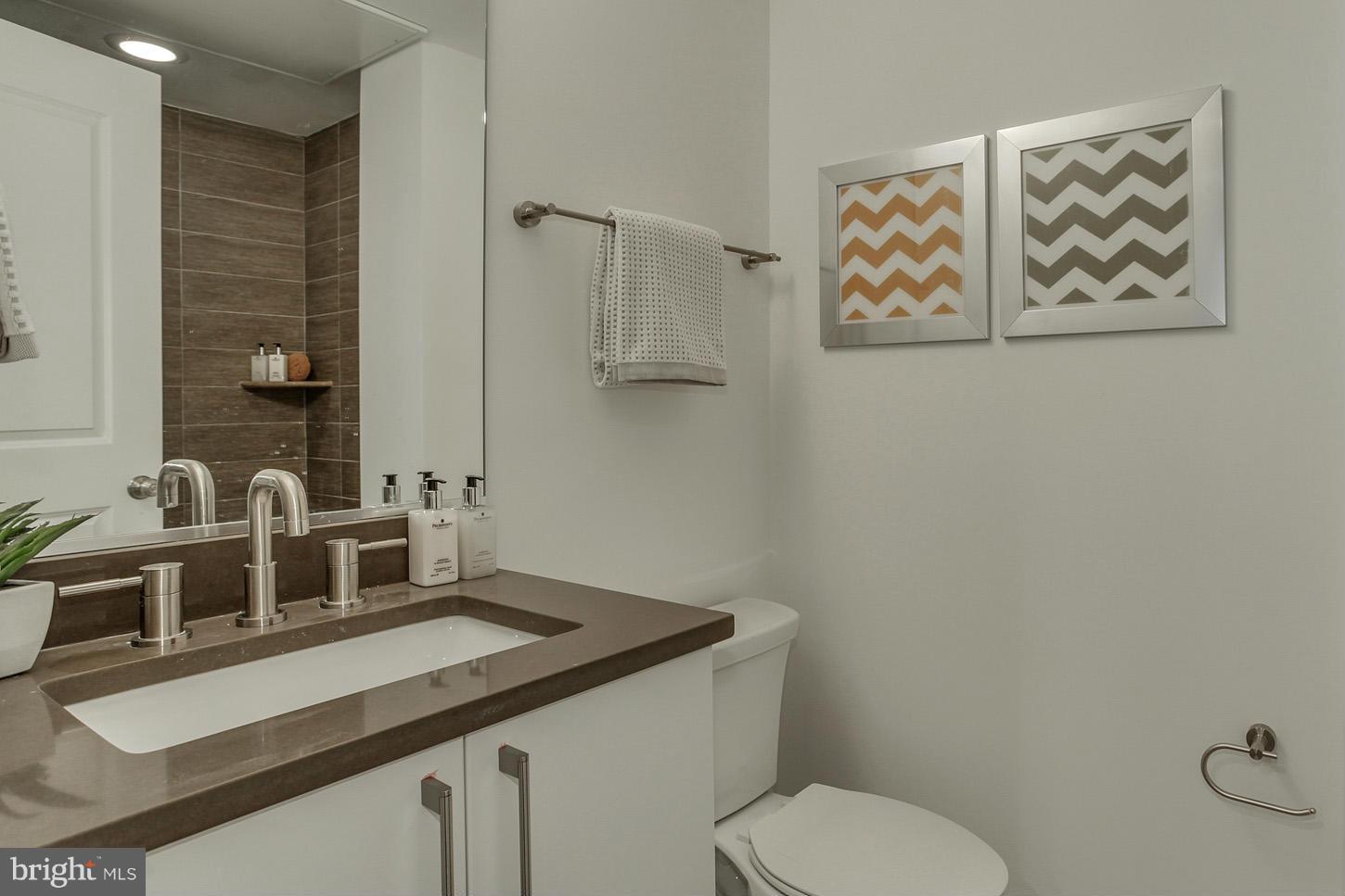 1839 6th Street Northwest, Unit 4 Washington, DC 20001 - Photo 18 of 29 a bathroom with a sink and a toilet