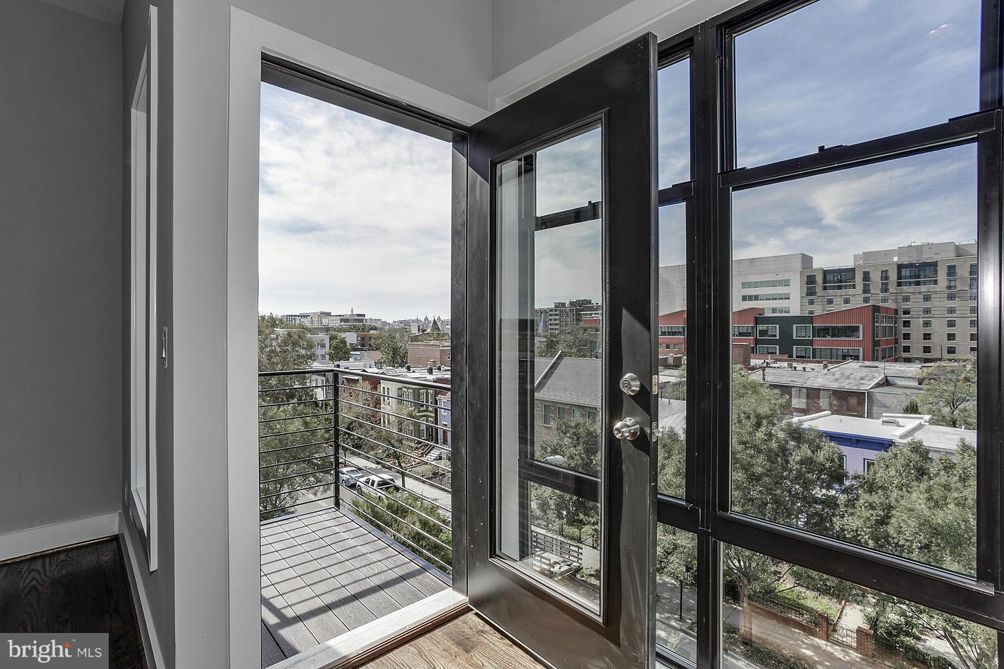 1839 6th Street Northwest, Unit 4 Washington, DC 20001 - Photo 22 of 29 a view of a city from a window
