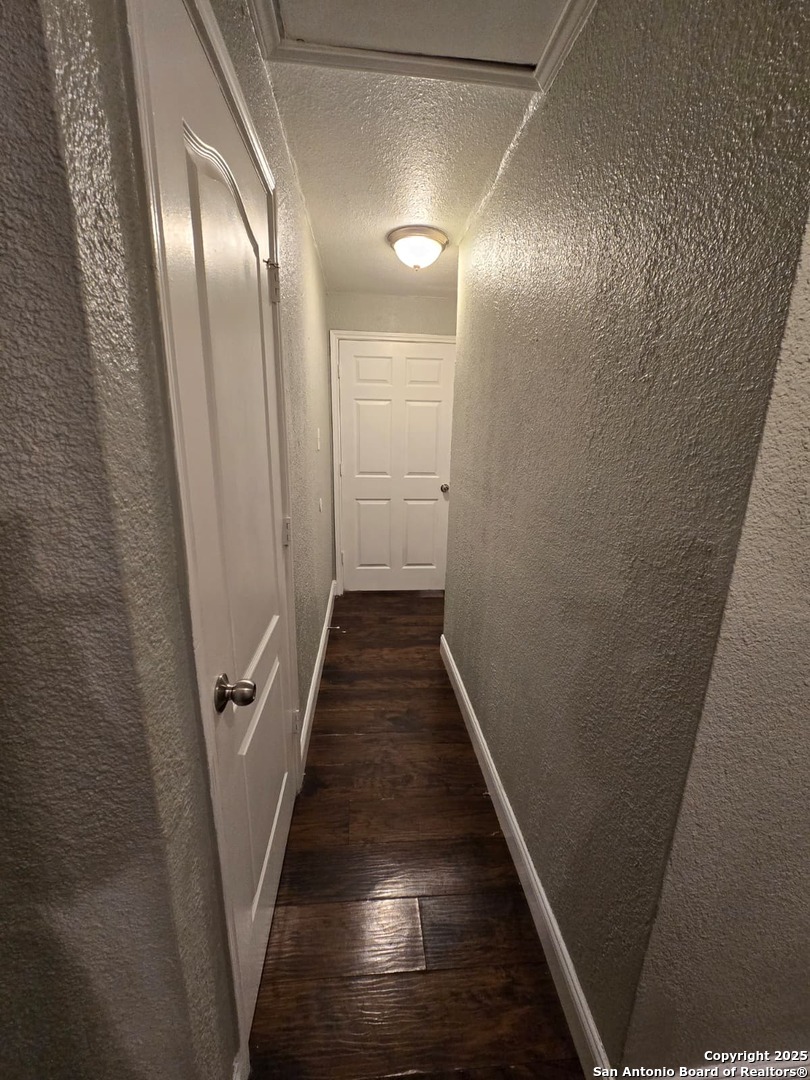 1718 Commercial, Unit B San Antonio, TX 78221 - Photo 5 of 13 a view of a hallway with wooden floor