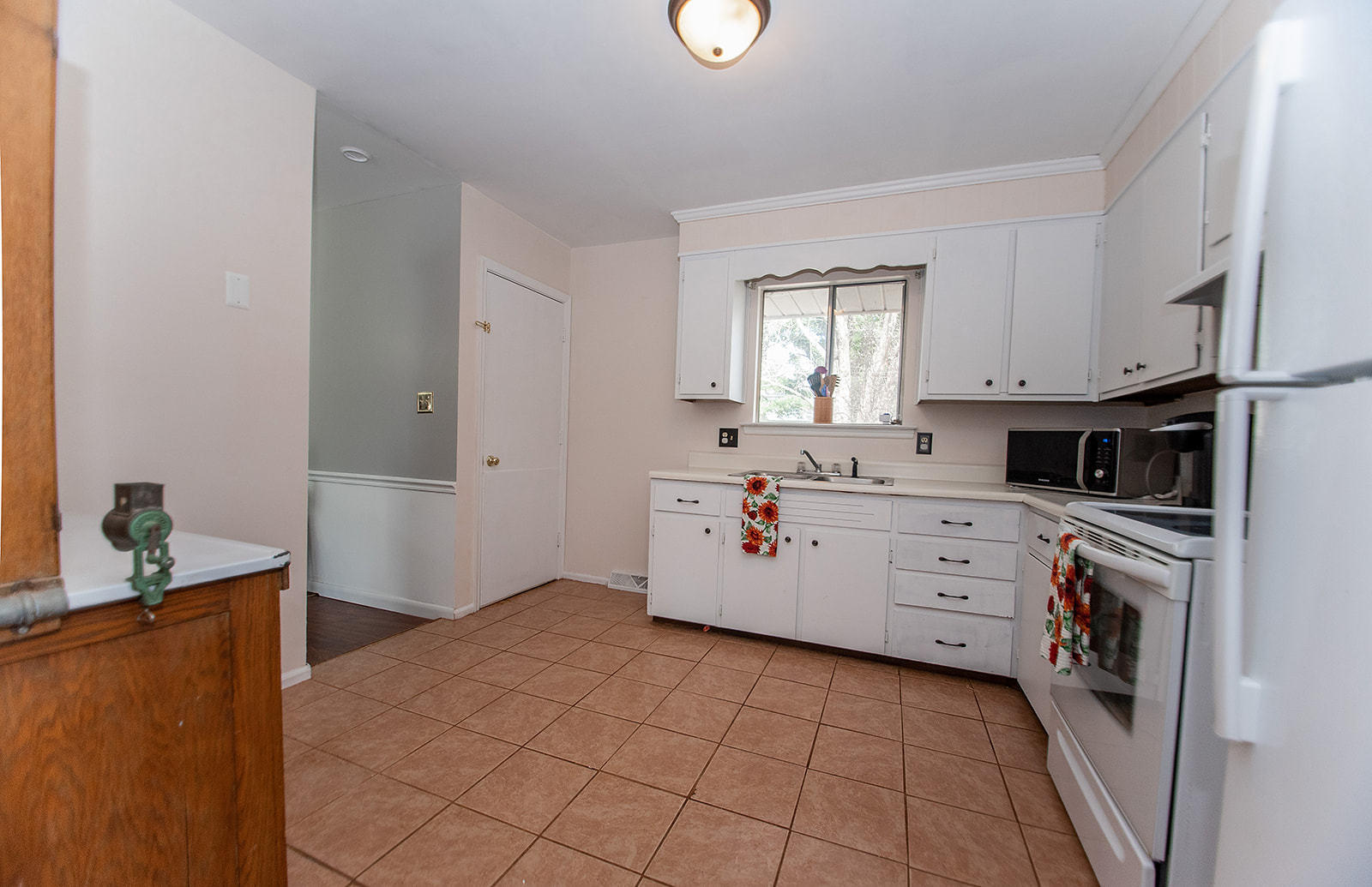 549 Holiday Road Vinton, VA 24179 - Photo 22 of 30 a kitchen with a sink cabinets and window