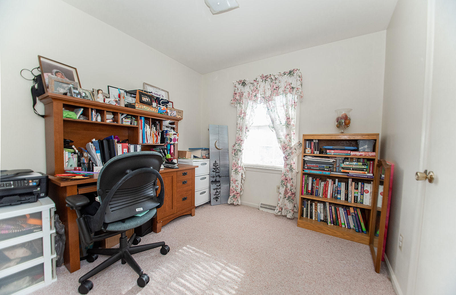 549 Holiday Road Vinton, VA 24179 - Photo 23 of 30 a view of a workspace with furniture and a bookshelf