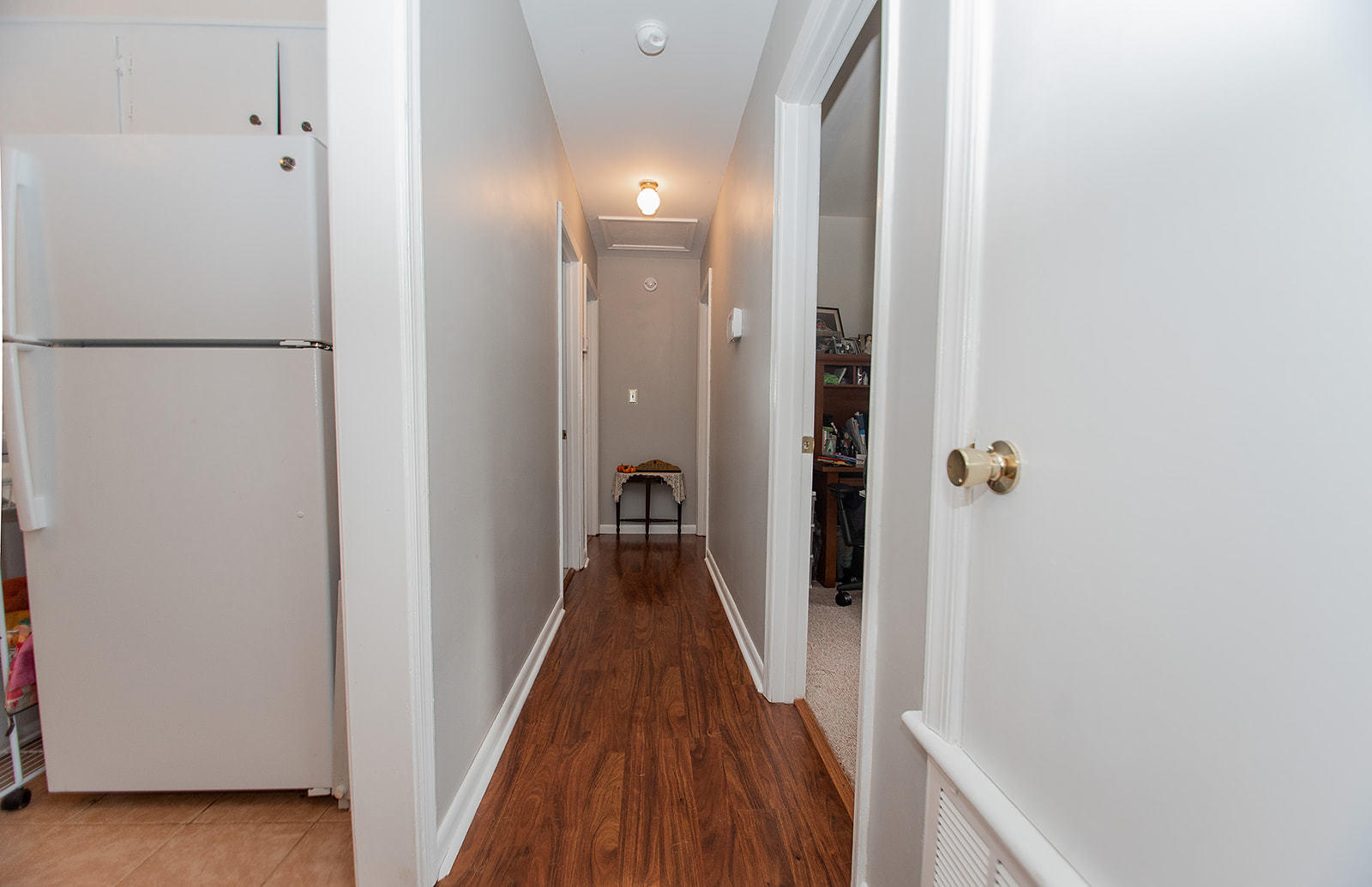549 Holiday Road Vinton, VA 24179 - Photo 29 of 30 a view of a hallway with wooden floor and staircase