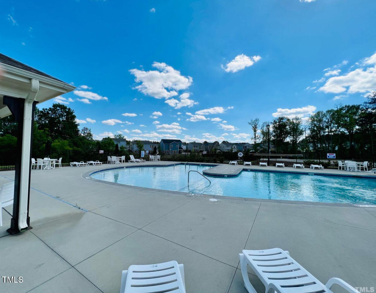 1157 Chestnut Bluff Apex, NC 27502 - Photo 41 of 42 a view of a swimming pool with a patio