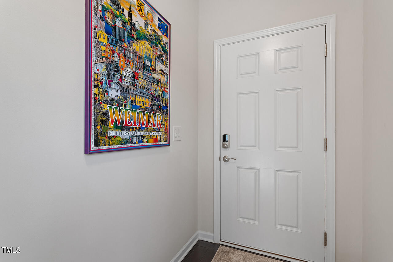 1157 Chestnut Bluff Apex, NC 27502 - Photo 5 of 42 an entryway with a wall