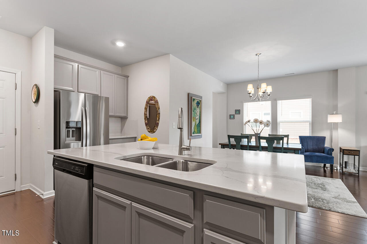 1157 Chestnut Bluff Apex, NC 27502 - Photo 10 of 42 a kitchen with counter top space cabinets and appliances