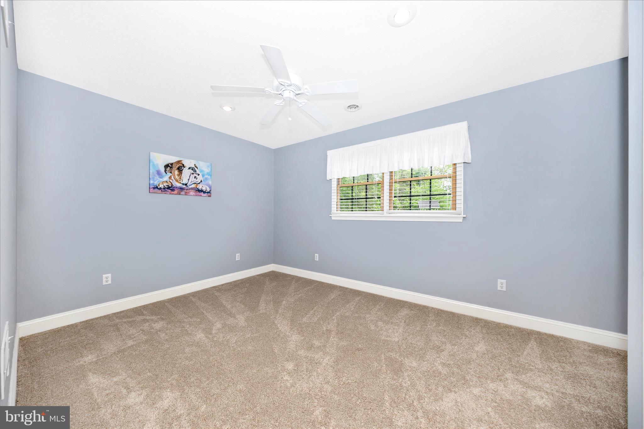 15810 Spade Road Hagerstown, MD 21740 - Photo 28 of 76 an empty room with windows and fan