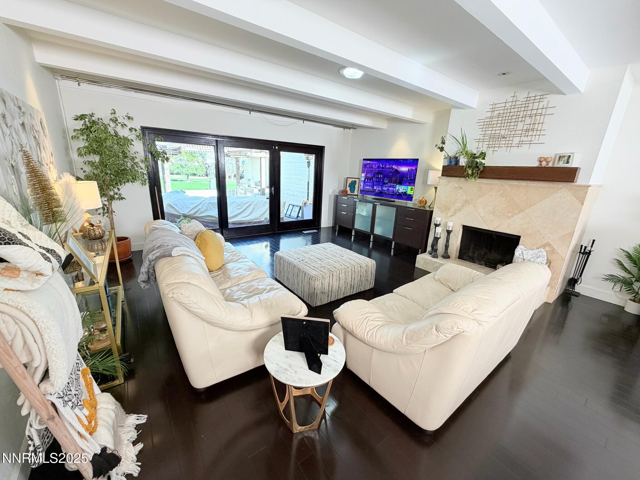 5012 Lakeridge Terrace East Reno, NV 89509 - Photo 11 of 49 a living room with furniture and a fireplace