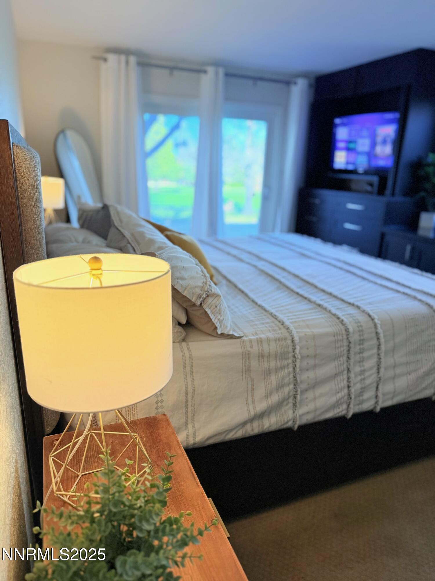 5012 Lakeridge Terrace East Reno, NV 89509 - Photo 17 of 49 a bed room with a bed