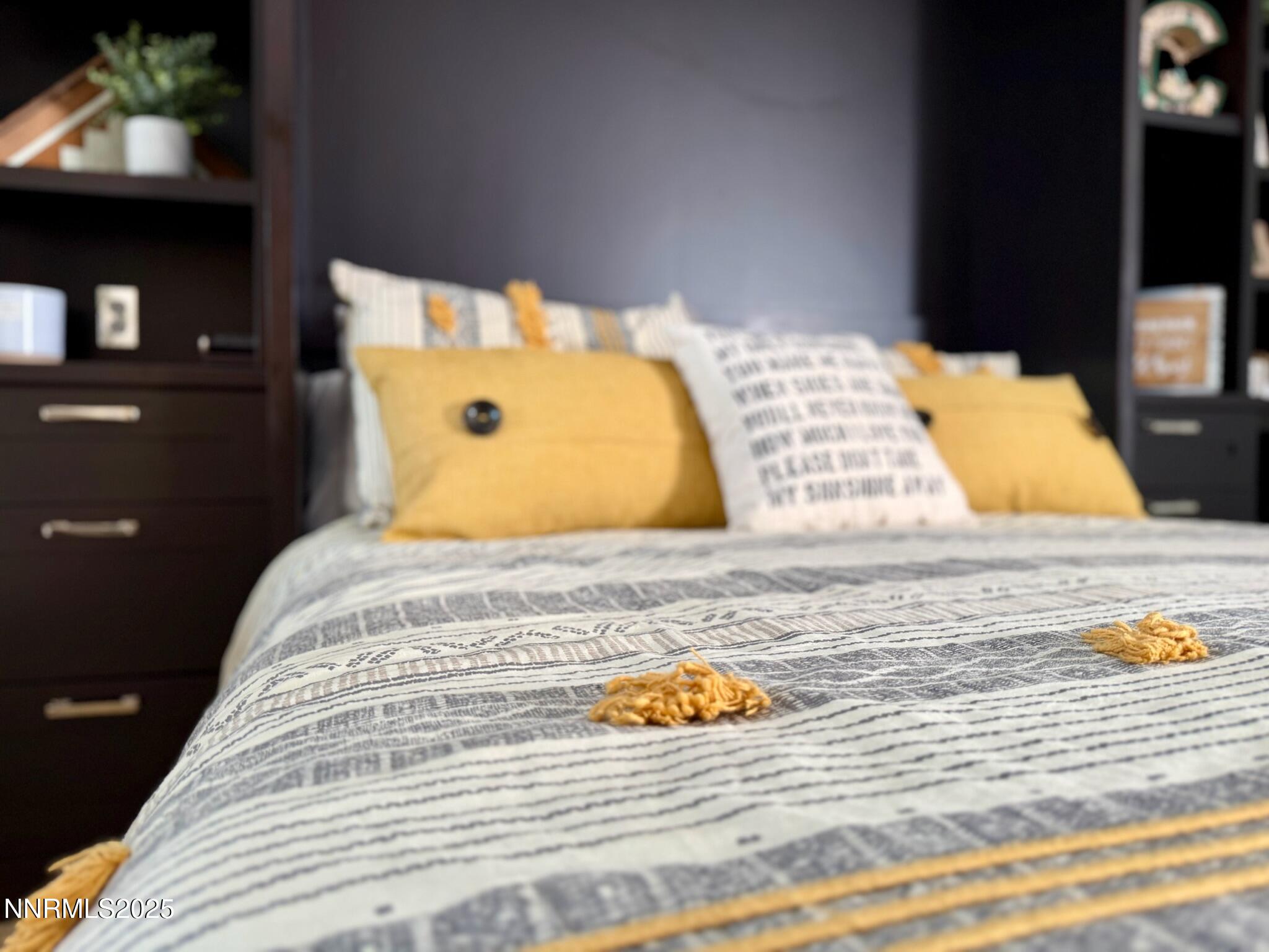 5012 Lakeridge Terrace East Reno, NV 89509 - Photo 26 of 49 a bedroom with a bed and walk in closet