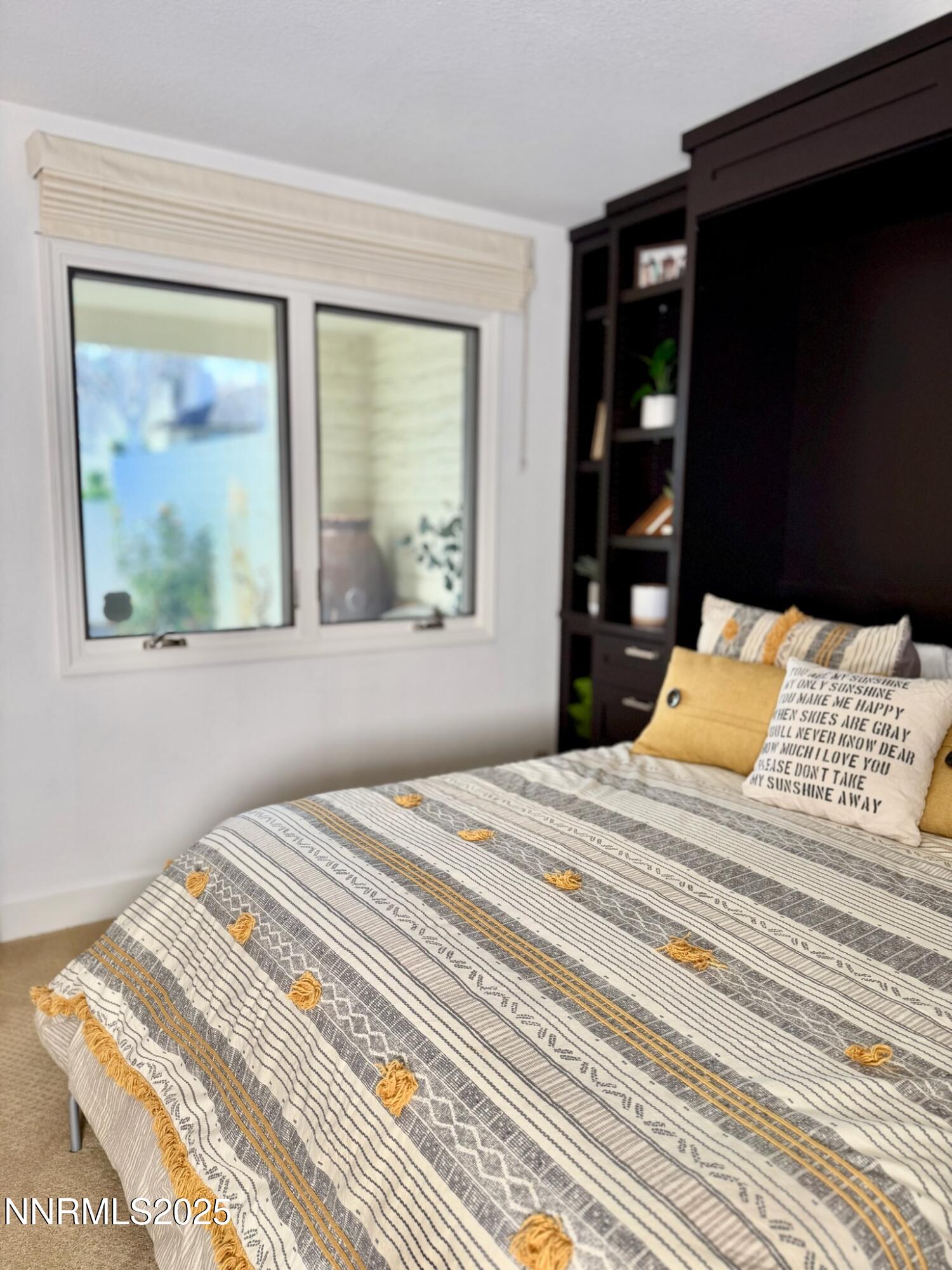 5012 Lakeridge Terrace East Reno, NV 89509 - Photo 29 of 49 a bedroom with a bed and a large window