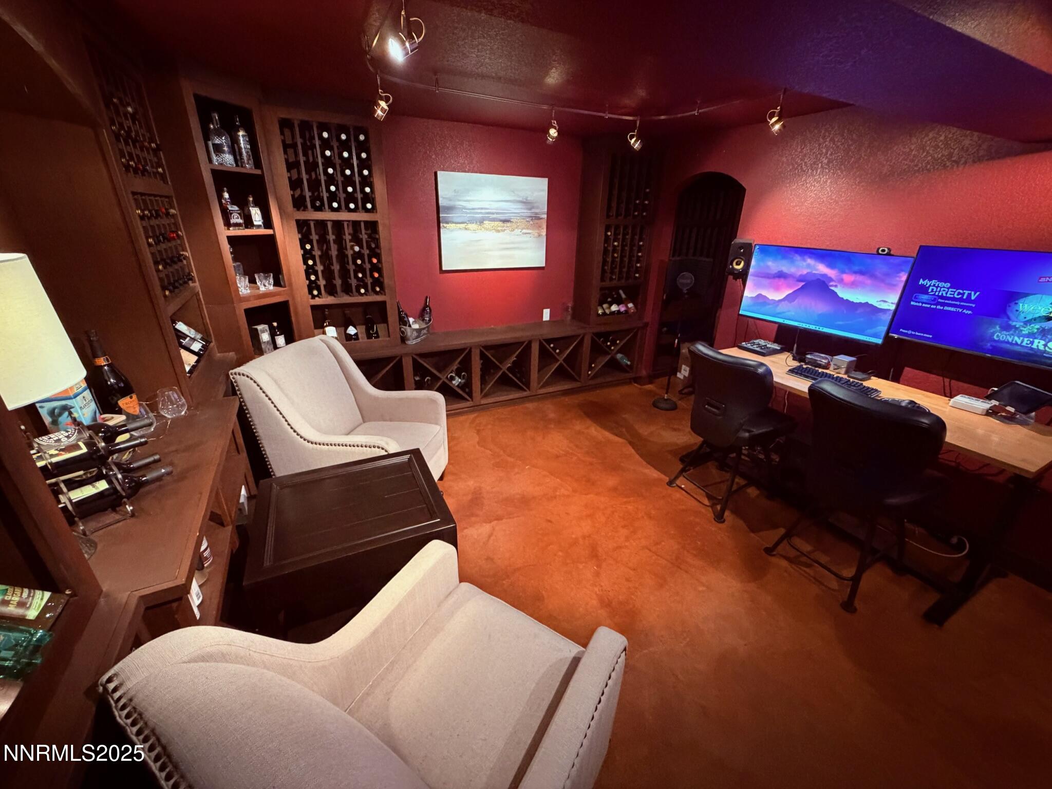 5012 Lakeridge Terrace East Reno, NV 89509 - Photo 45 of 49 a living room with furniture gym equipment and a flat screen tv
