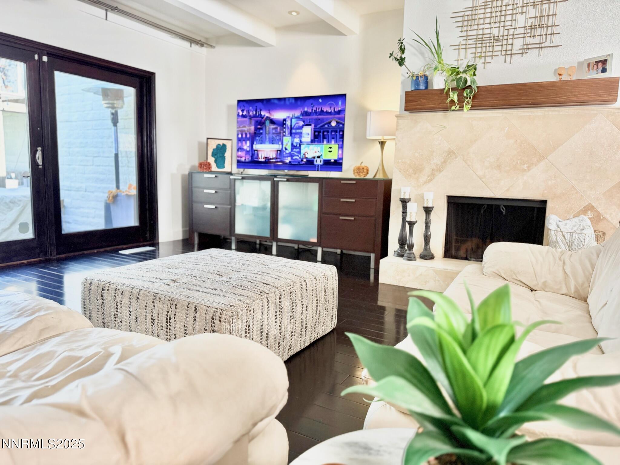 5012 Lakeridge Terrace East Reno, NV 89509 - Photo 9 of 49 a bedroom with bed and a couch