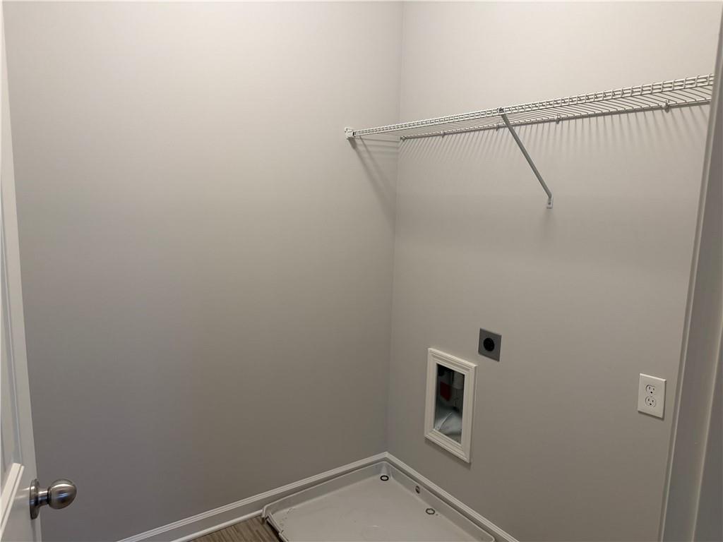 7811 Silk Tree Pointe Braselton, GA 30517 - Photo 18 of 20 a bathroom with a shower