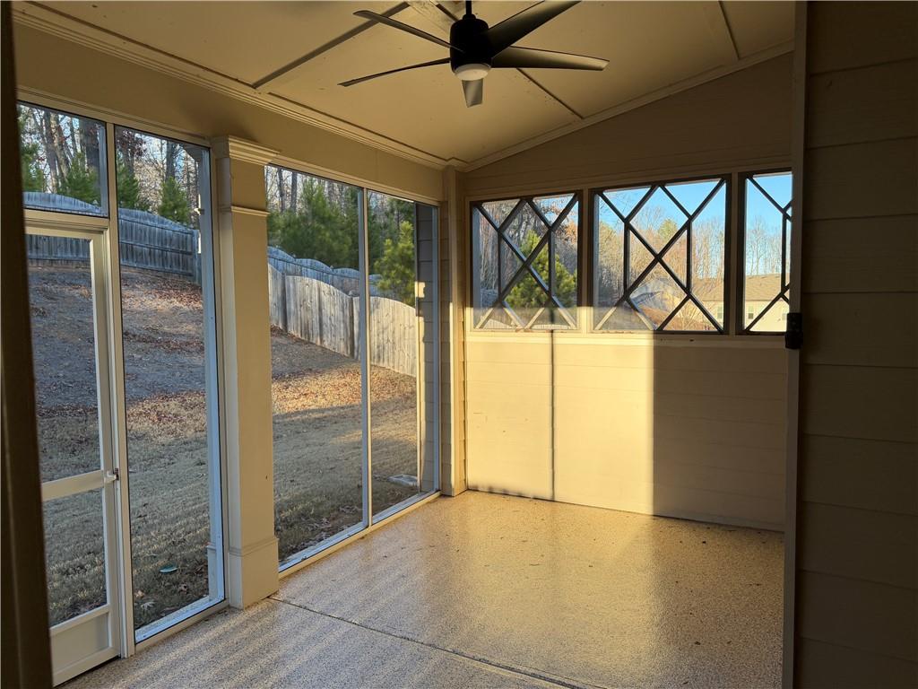 7811 Silk Tree Pointe Braselton, GA 30517 - Photo 19 of 20 a view of empty room with wooden floor and fan