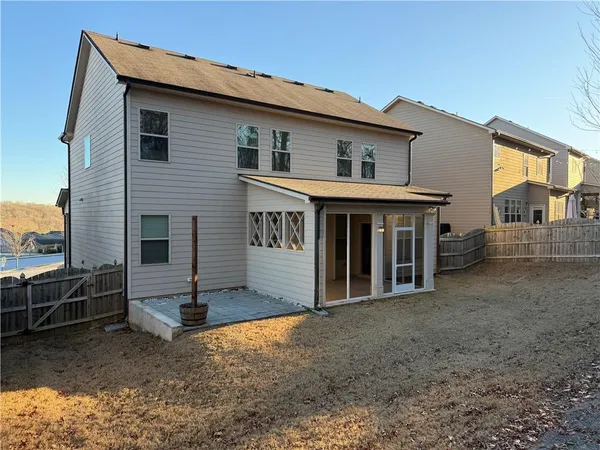 a front view of a house with garage