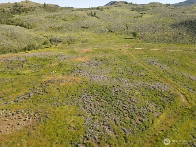 a view of ocean and a mountain