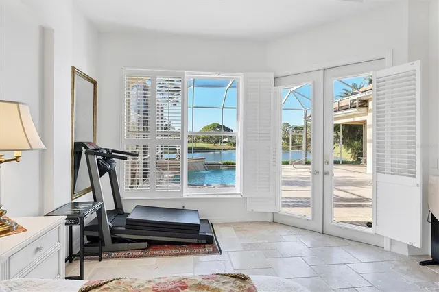 a bathroom with a shower a toilet and a sink