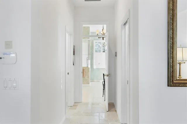 an aerial view of a house with a lake view