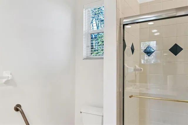 a view of a golf course with a lake view