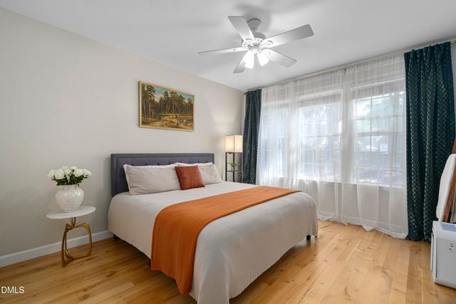 a view of a chairs and table in patio