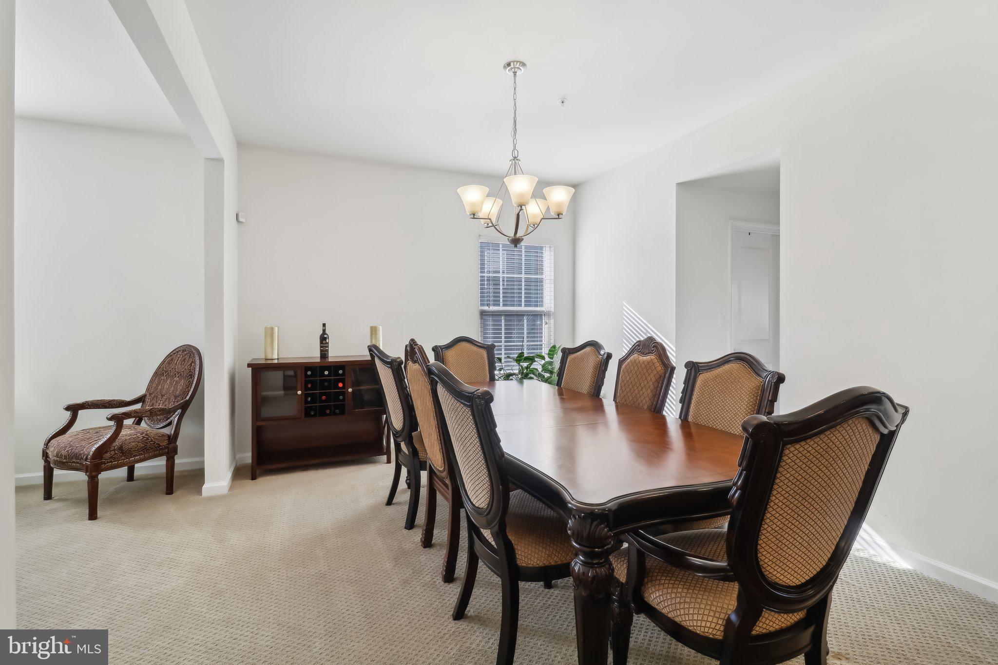 14013 Wheel Wright Place Accokeek, MD 20607 - Photo 5 of 38 a view of a dining room with furniture and window