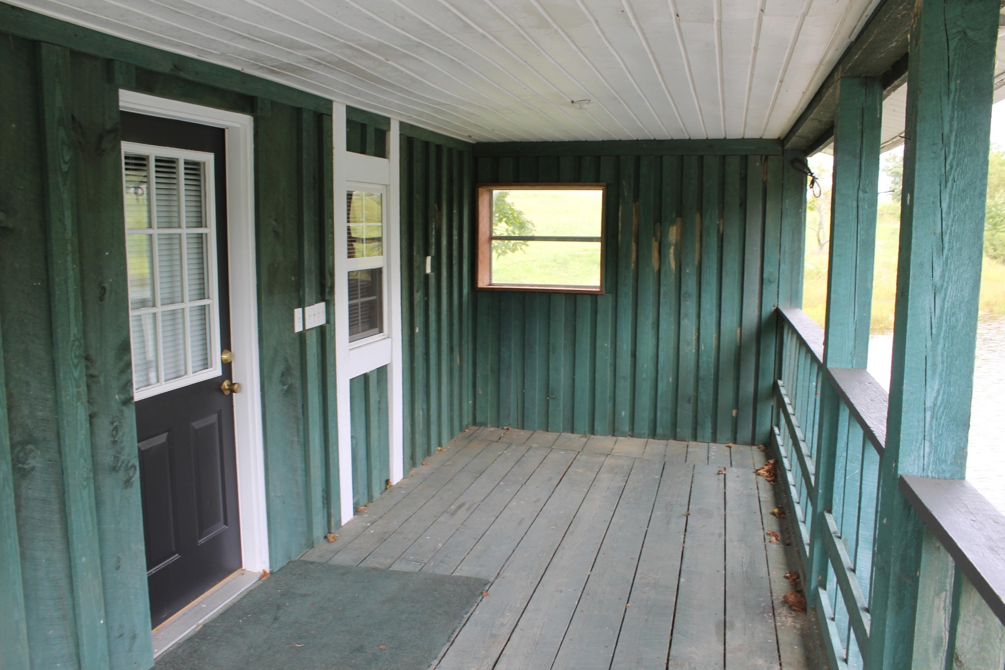 1326 Virgil Beaty Road Clarkrange, TN 38553 - Photo 17 of 26 a view of backyard with a wooden deck