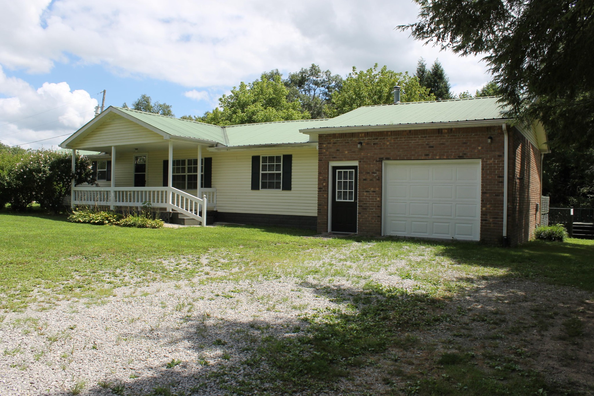 1326 Virgil Beaty Road Clarkrange, TN 38553 - Photo 22 of 26 a front view of house with yard and green space