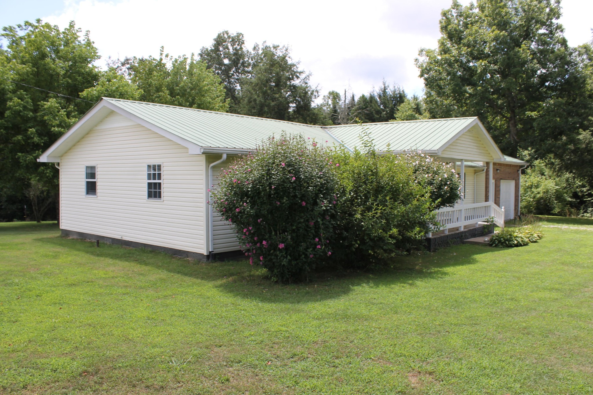 1326 Virgil Beaty Road Clarkrange, TN 38553 - Photo 4 of 26 a view of a house with backyard and garden