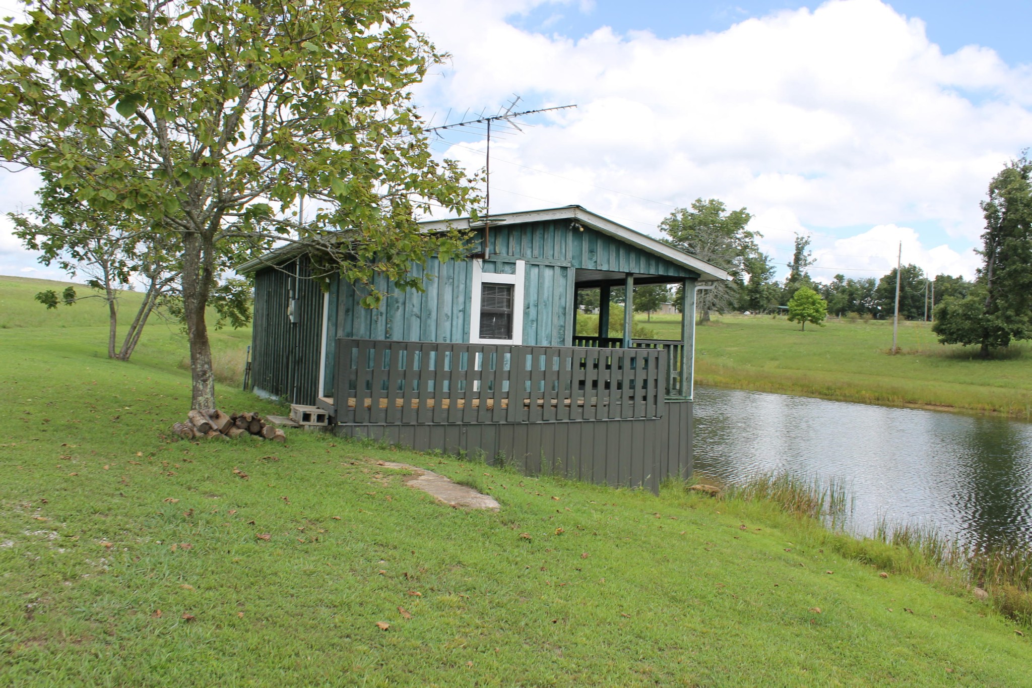 1326 Virgil Beaty Road Clarkrange, TN 38553 - Photo 5 of 26 a view of a house with a yard and sitting area