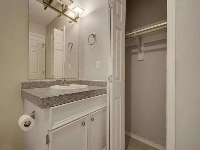 a view of a building with a street