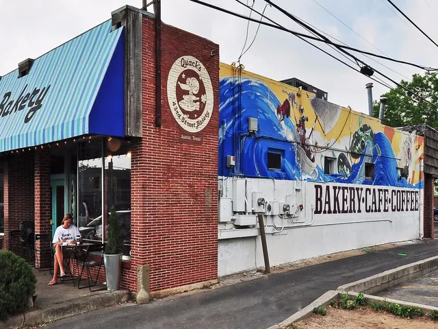 a view of kitchen with wooden floor
