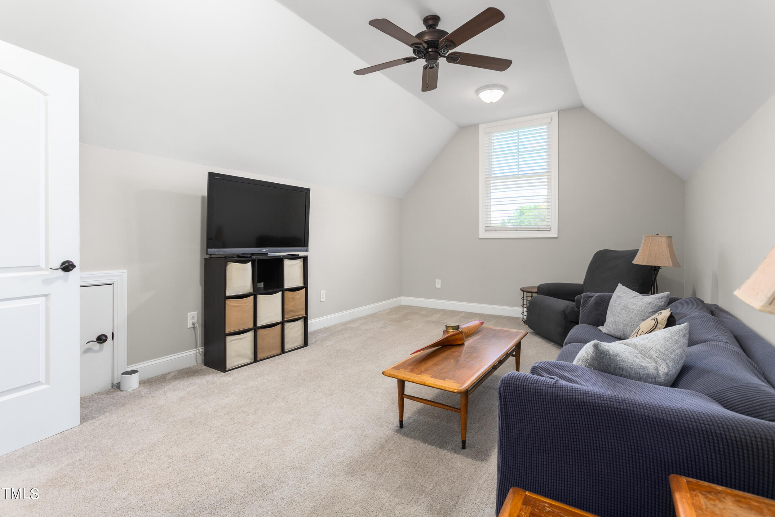 4455 Boyd Wright Road Burlington, NC 27215 - Photo 31 of 40 a living room with furniture and a window