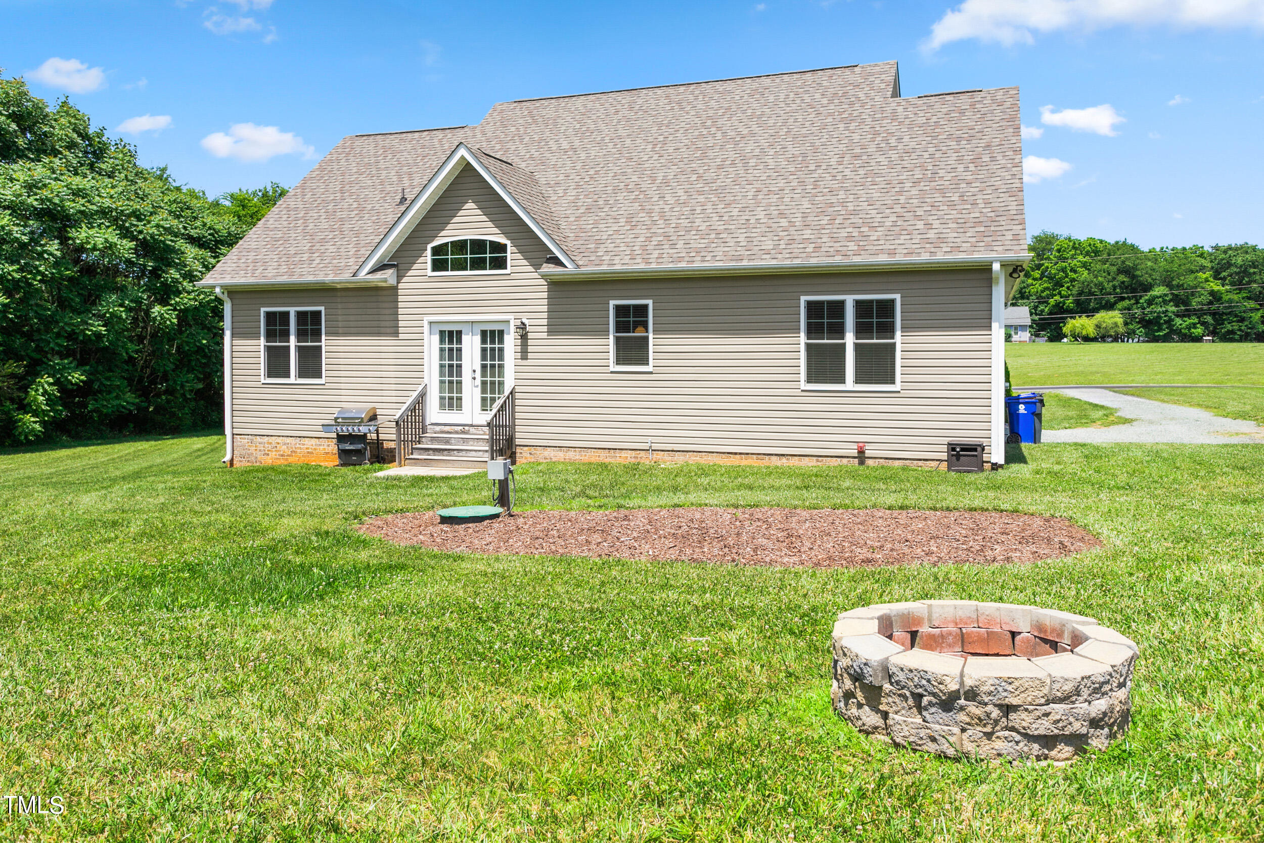 4455 Boyd Wright Road Burlington, NC 27215 - Photo 39 of 40 a front view of a house with a yard