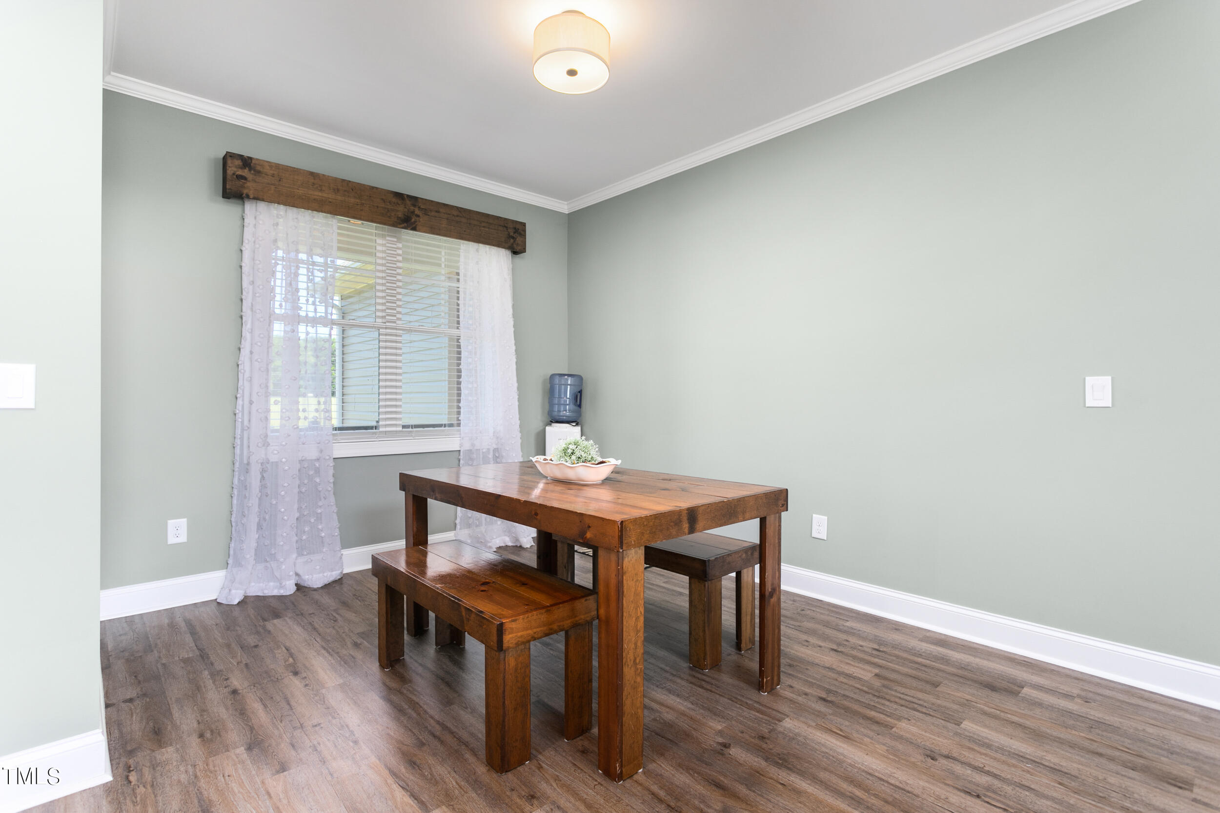 4455 Boyd Wright Road Burlington, NC 27215 - Photo 9 of 40 a view of a workspace with furniture and wooden floor