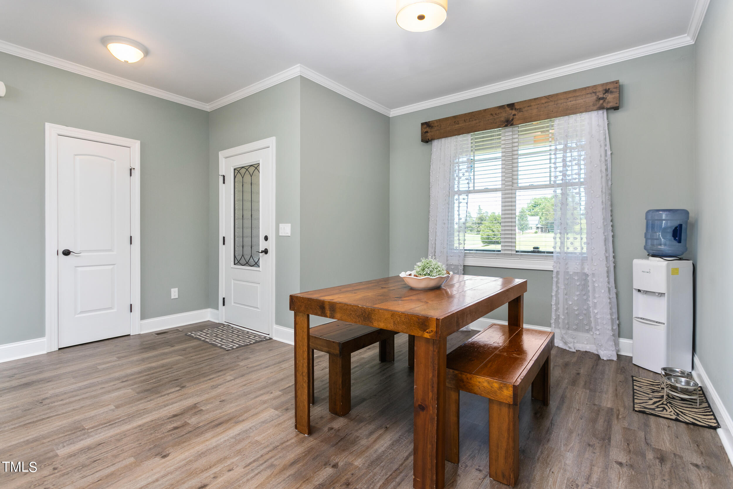 4455 Boyd Wright Road Burlington, NC 27215 - Photo 10 of 40 a view of a workspace with furniture and wooden floor
