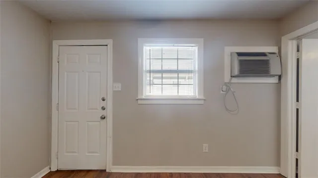 a kitchen with a sink appliances and cabinets