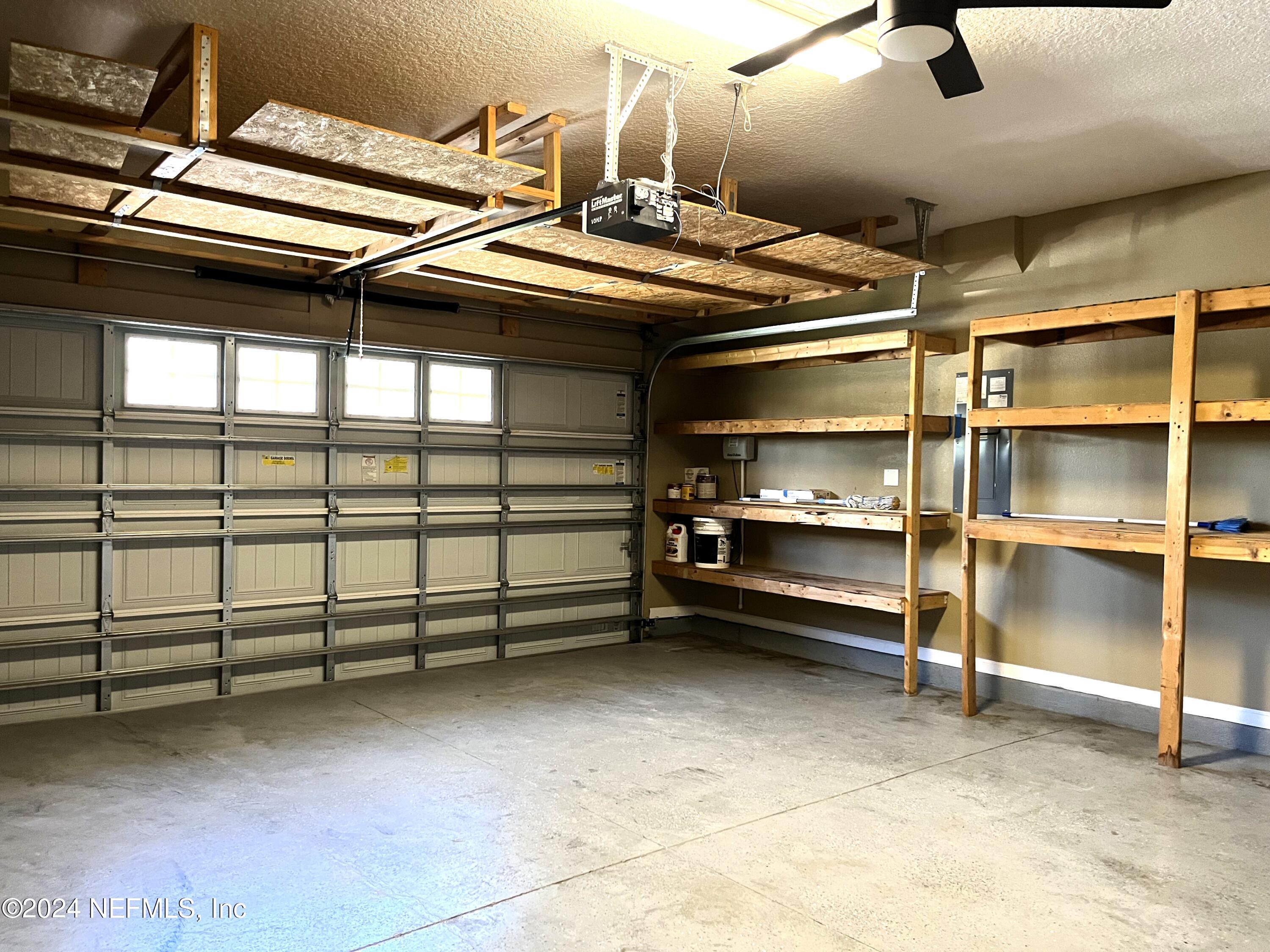 294 Buck Run Way St. Augustine, FL 32092 - Photo 16 of 22 a view of a room with racks