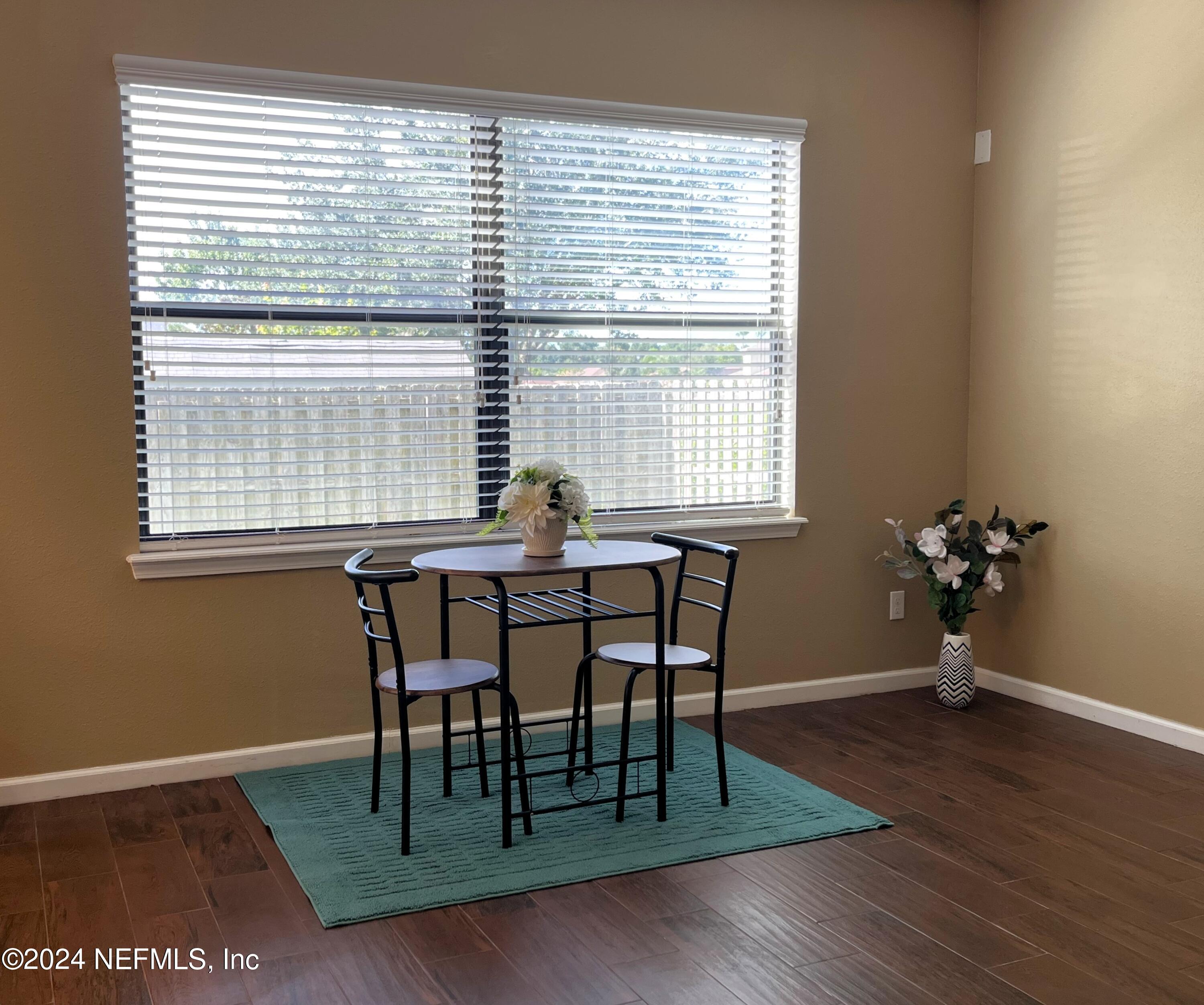 294 Buck Run Way St. Augustine, FL 32092 - Photo 7 of 22 a dining room with furniture and window
