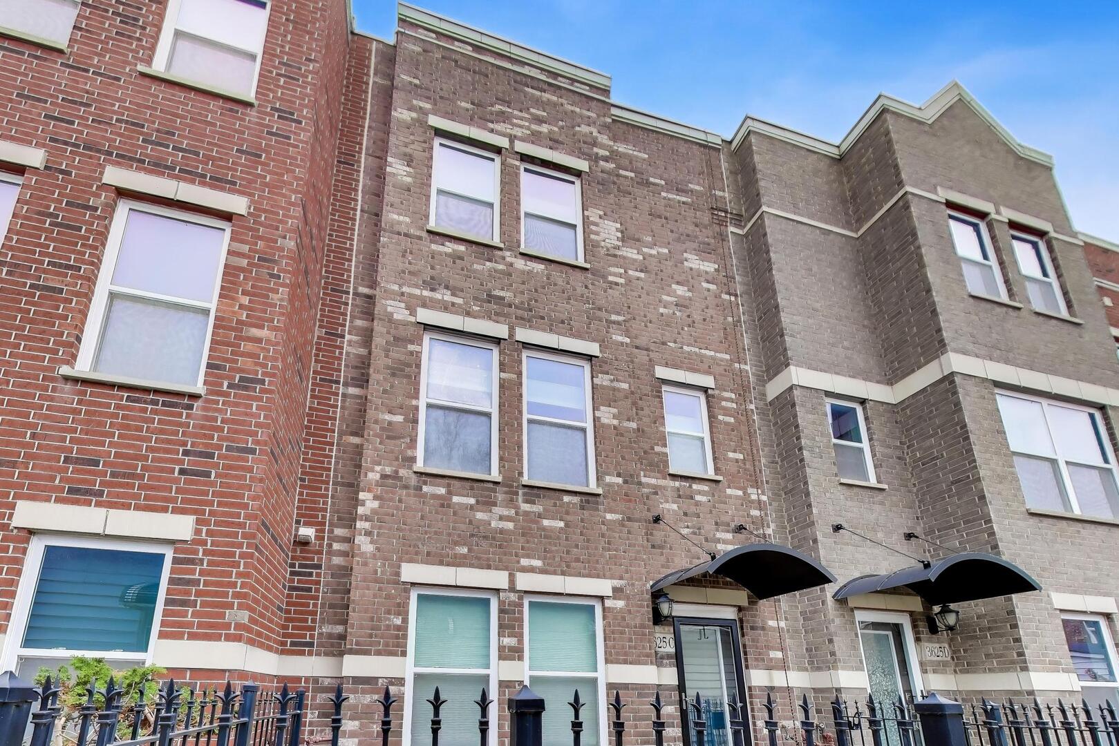 3625 South Morgan Street, Unit C Chicago, IL 60609 - Photo 2 of 44 a front view of a building with glass windows