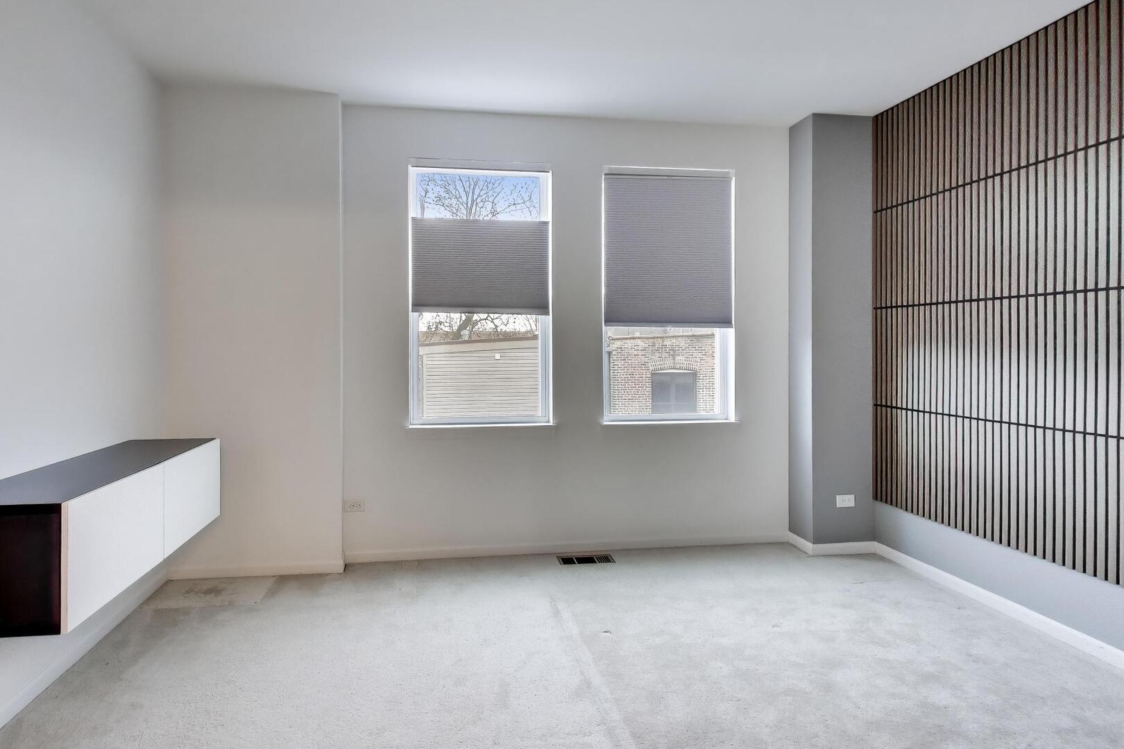 3625 South Morgan Street, Unit C Chicago, IL 60609 - Photo 22 of 44 a view of an empty room with a window
